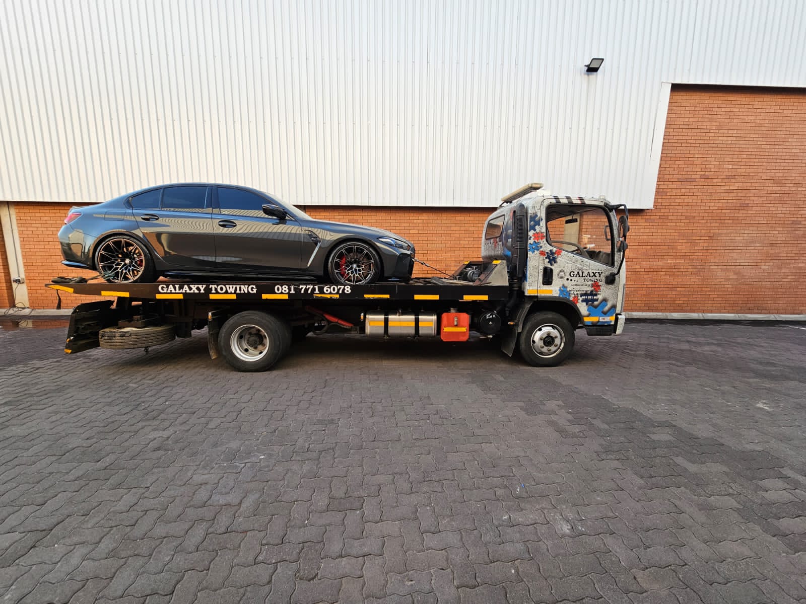 Galaxy Towing transporting a 1936 vintage convertible